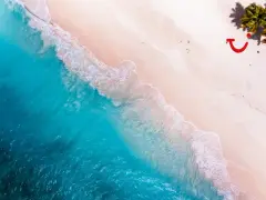 Turkusowe morze i różowy piasek plaży, idealne miejsce, by dowiedzieć się, gdzie leży Dominikana.